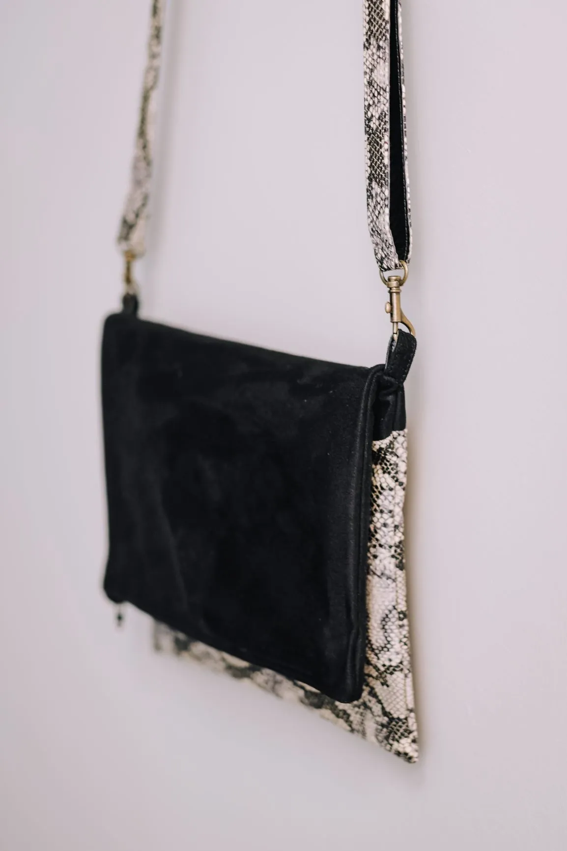 Cross-body foldover clutch