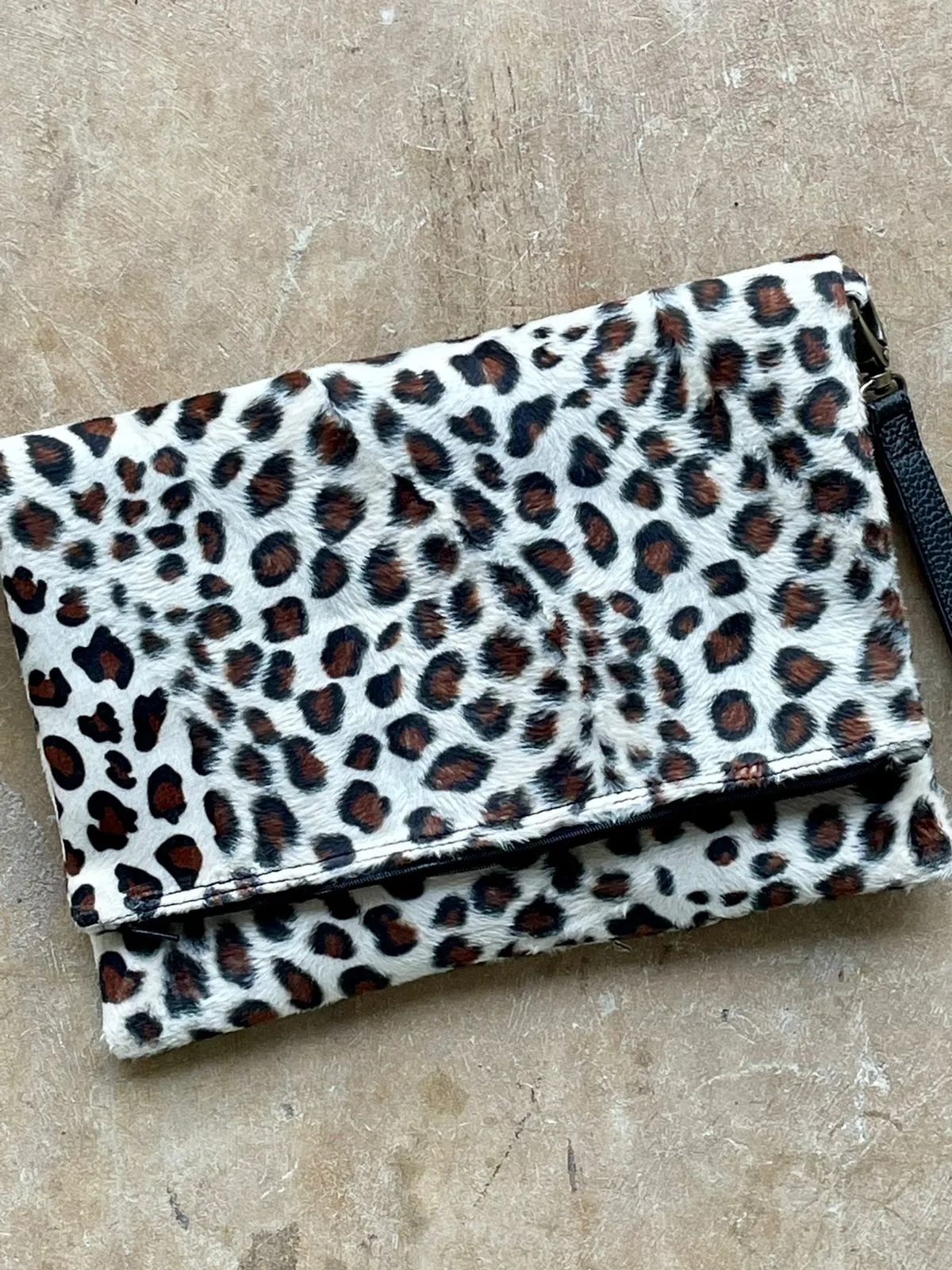 Cross-body foldover clutch