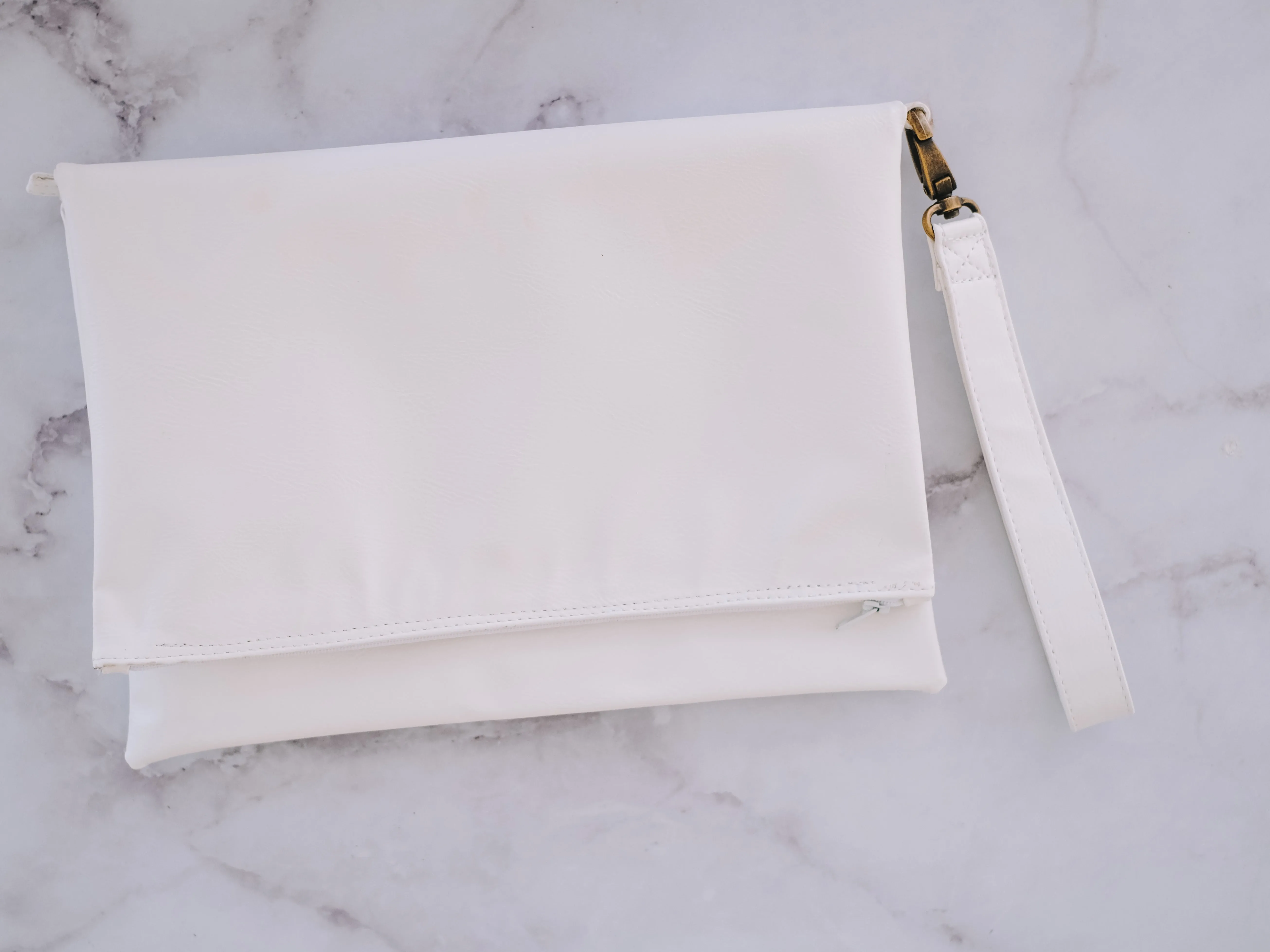 Cross-body foldover clutch