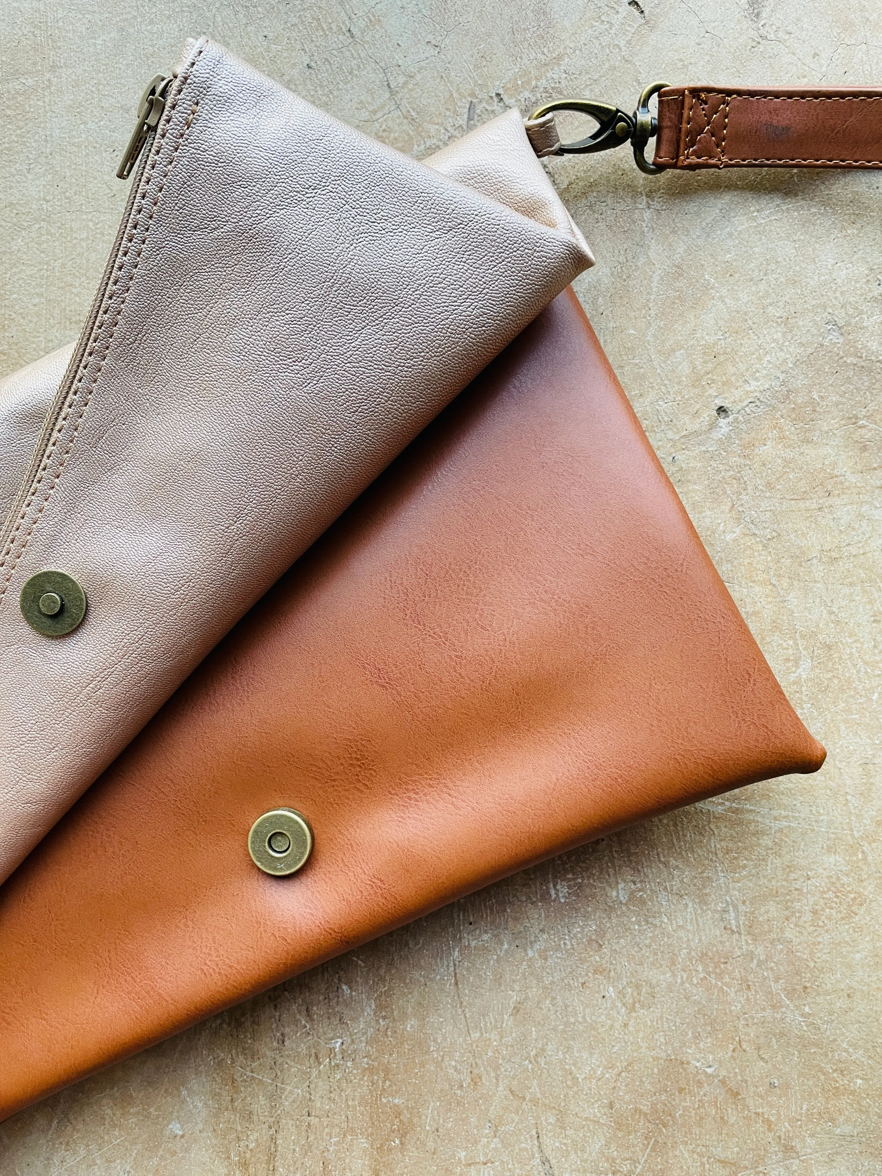 Cross-body foldover clutch