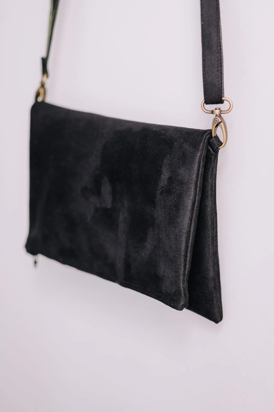 Cross-body foldover clutch