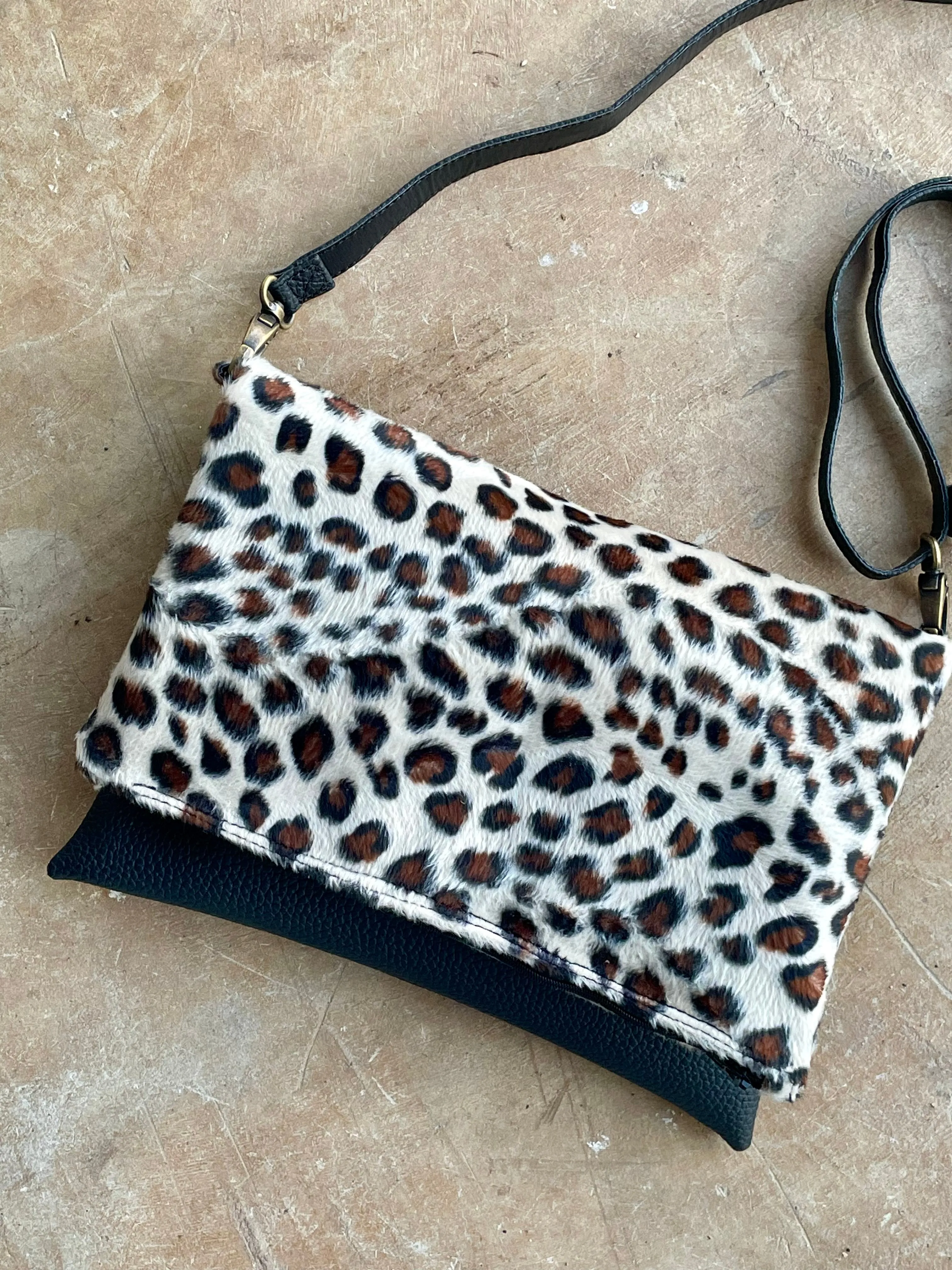 Cross-body foldover clutch