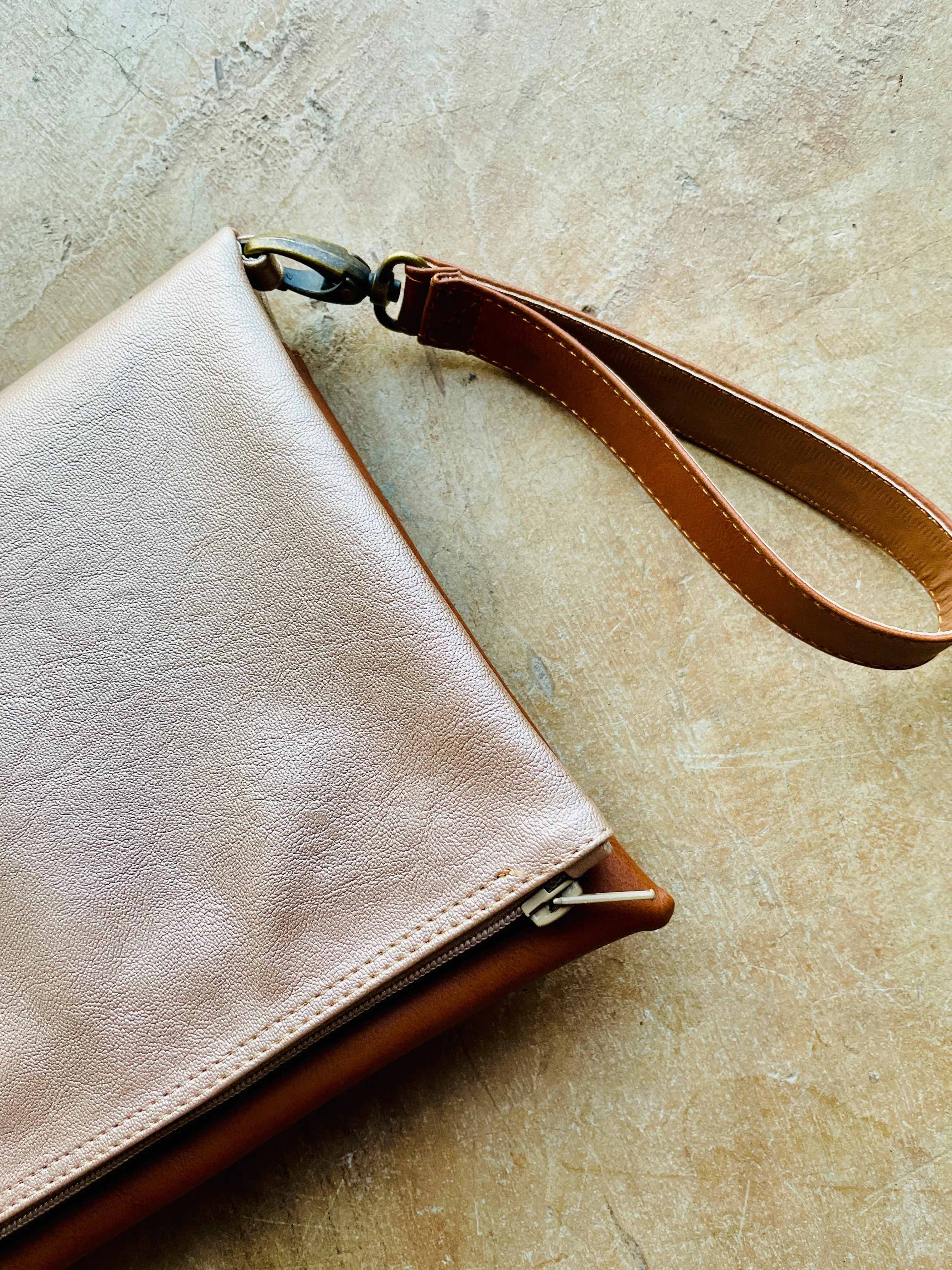 Cross-body foldover clutch