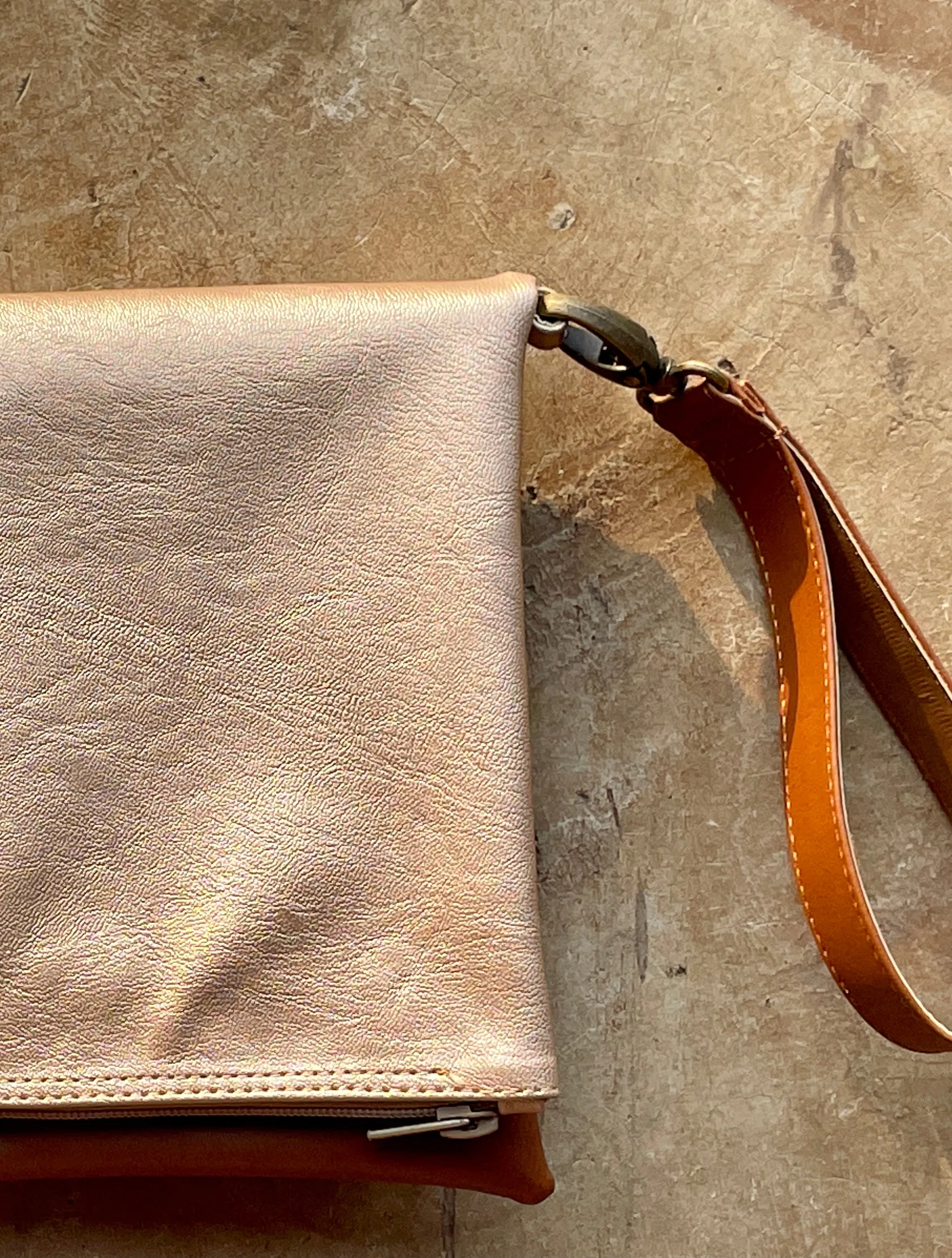 Cross-body foldover clutch
