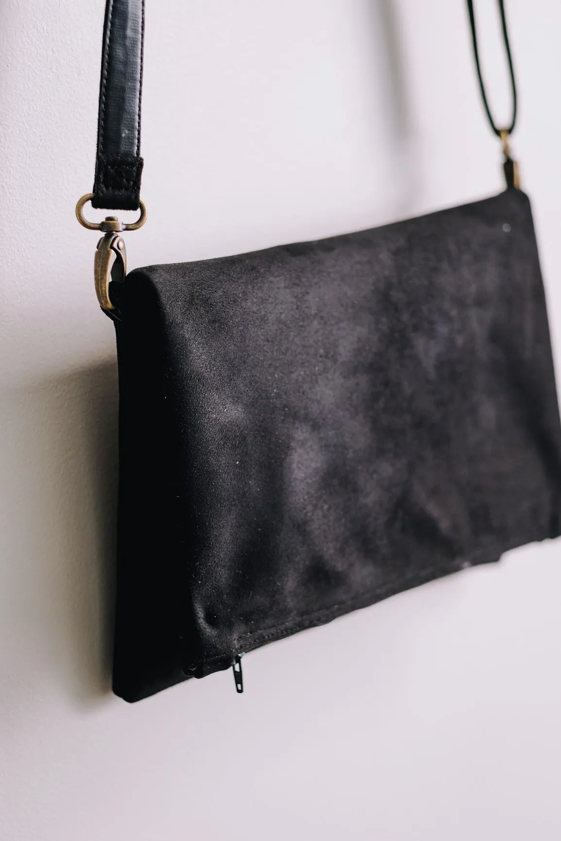 Cross-body foldover clutch