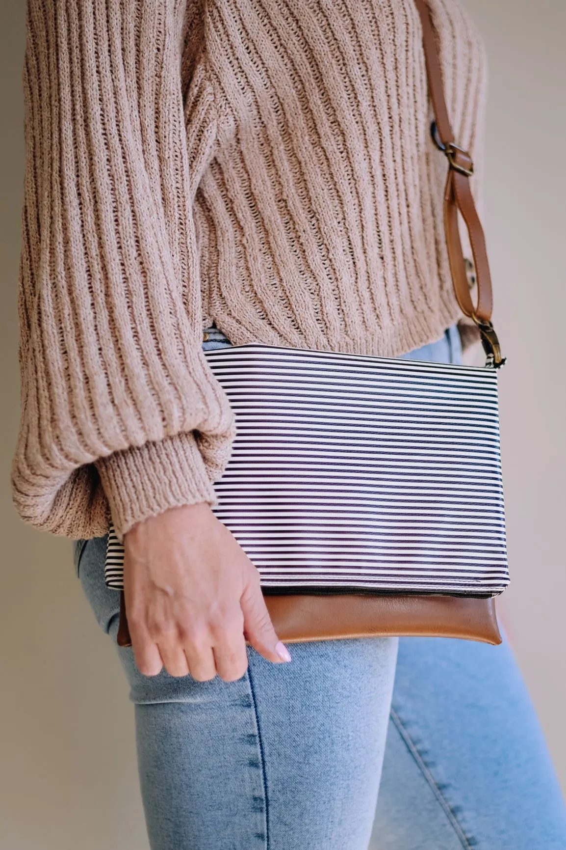 Cross-body foldover clutch