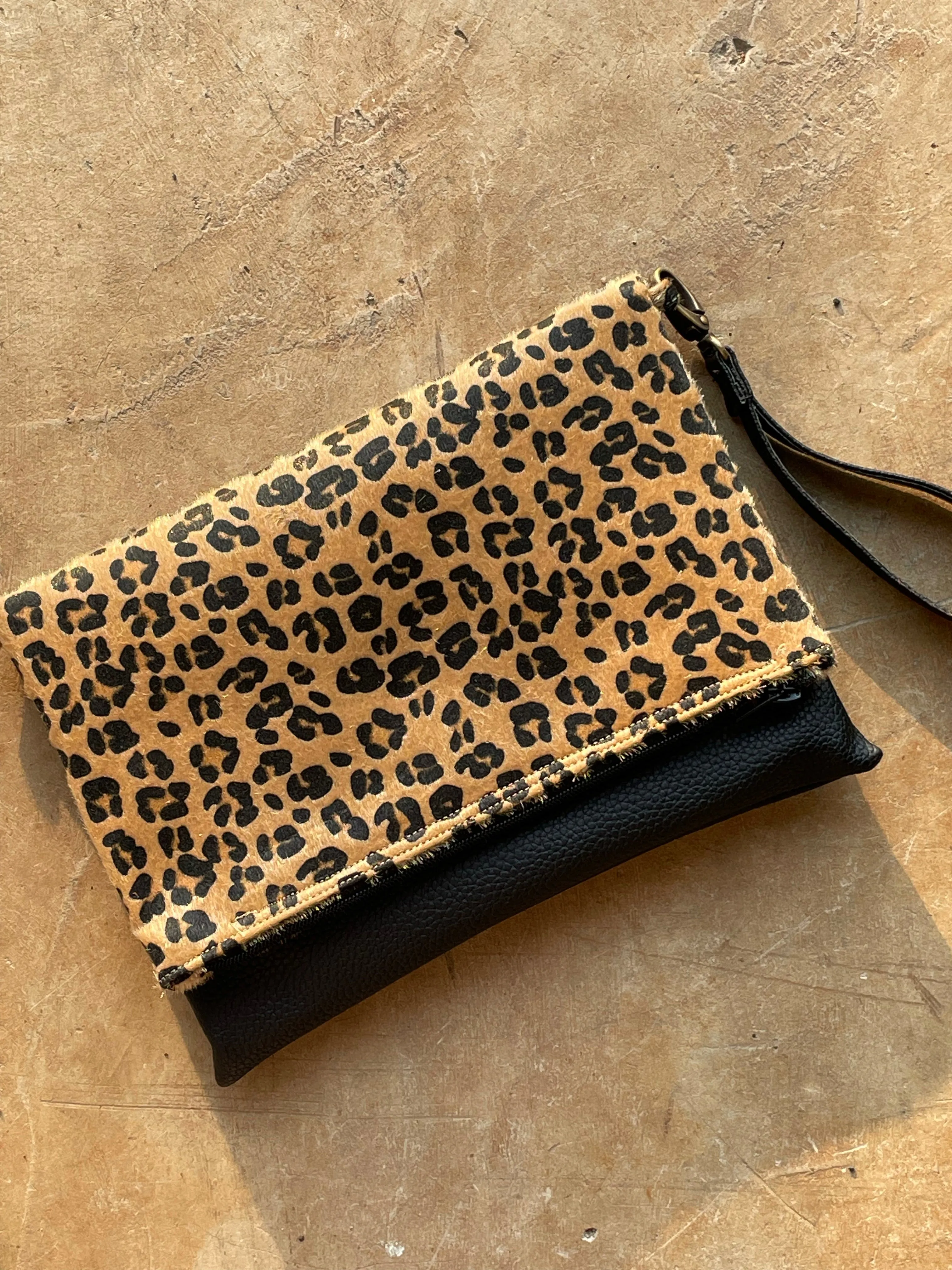 Cross-body foldover clutch