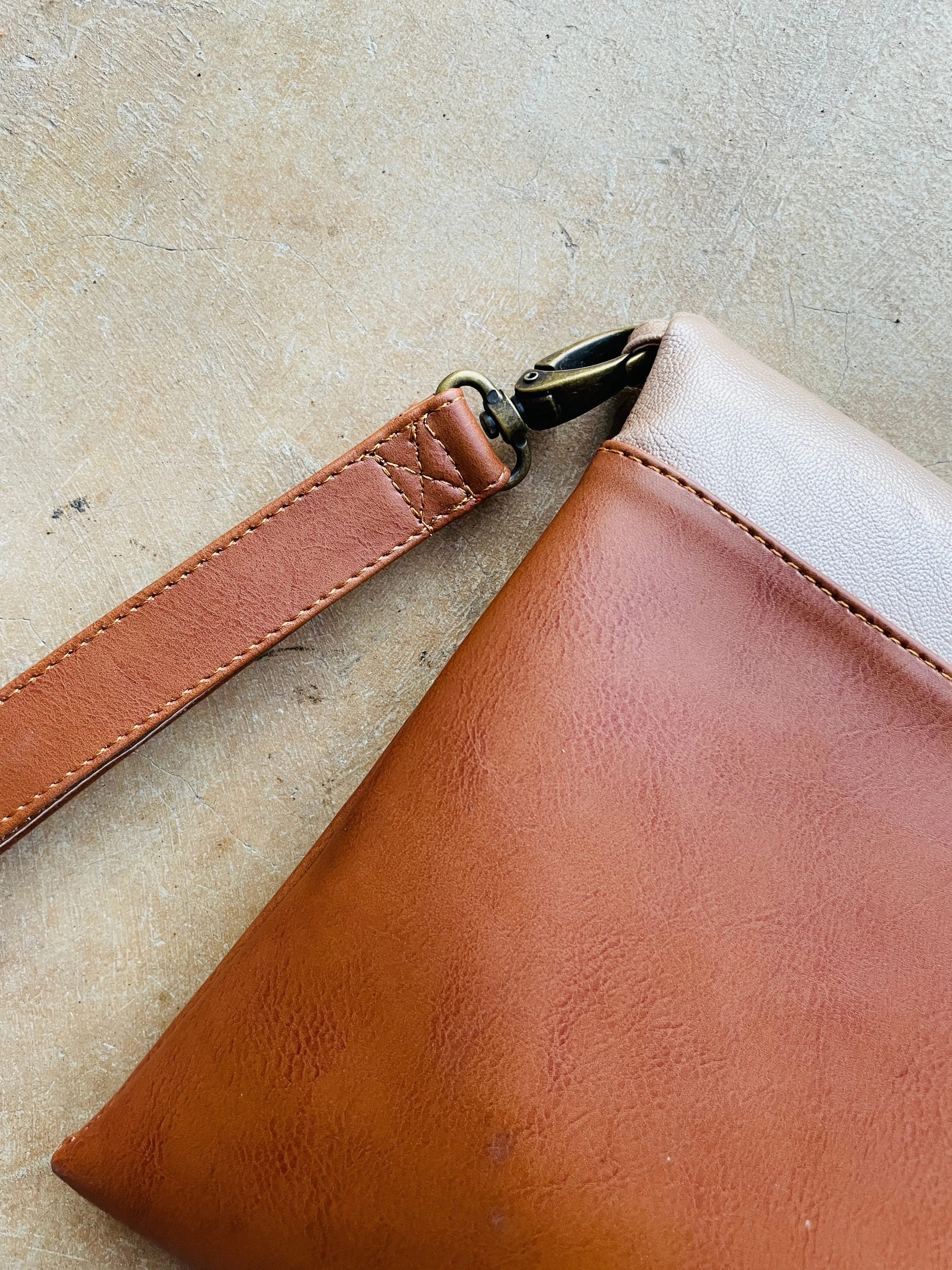 Cross-body foldover clutch