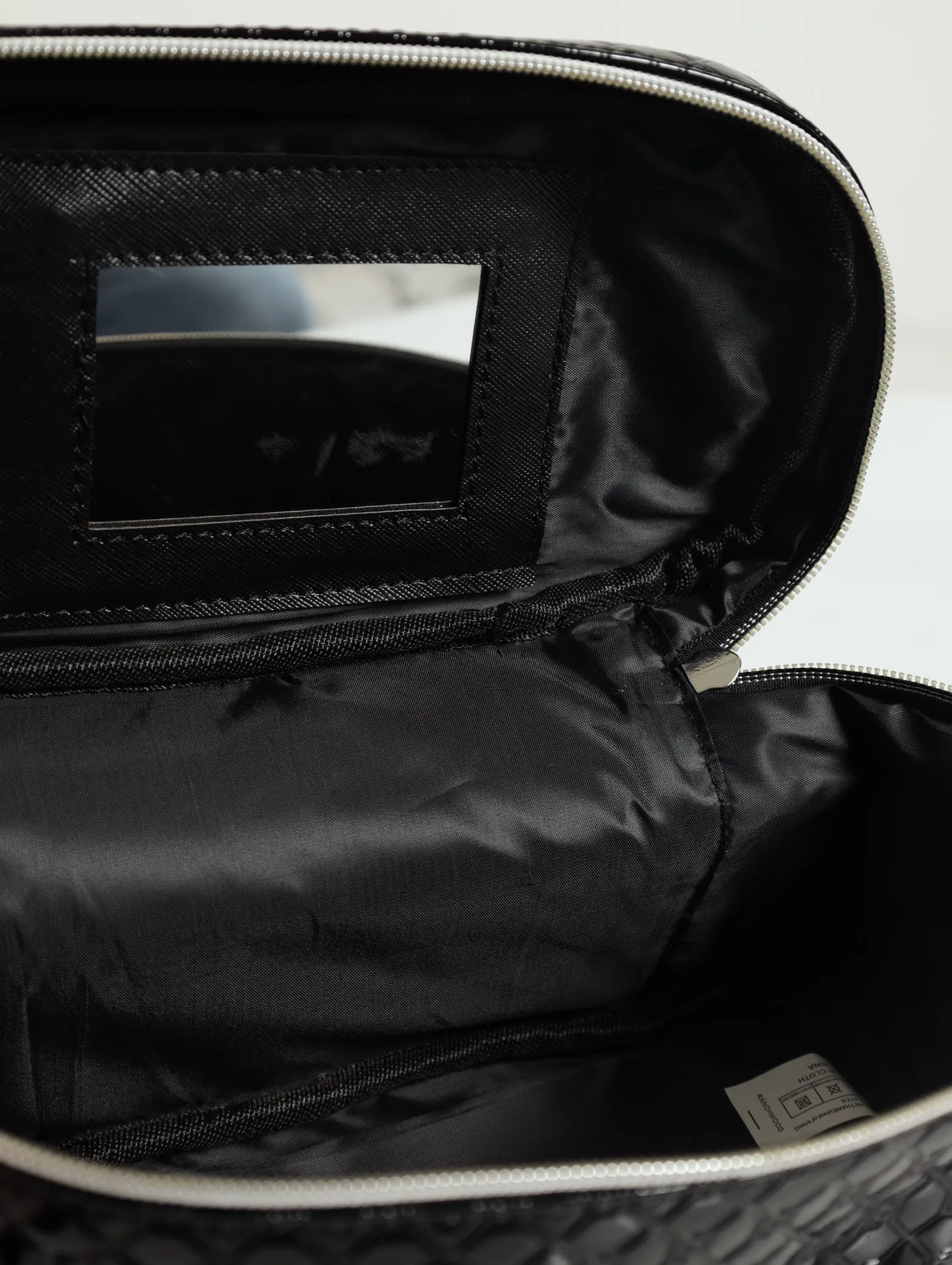 Embossed Monogram Cosmetic Bag - Black