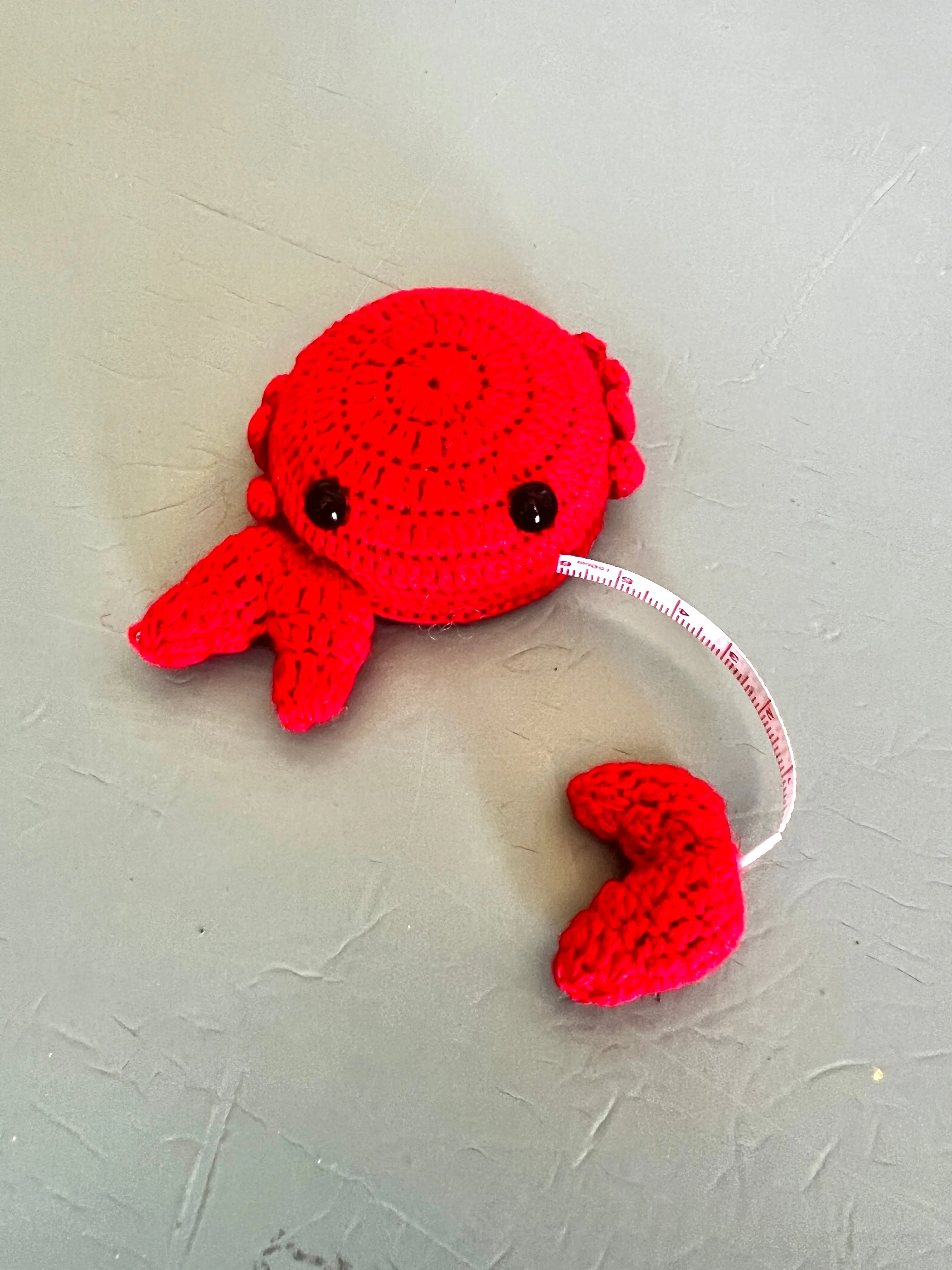 "Animal House" Tape Measures, hand crocheted by displaced persons