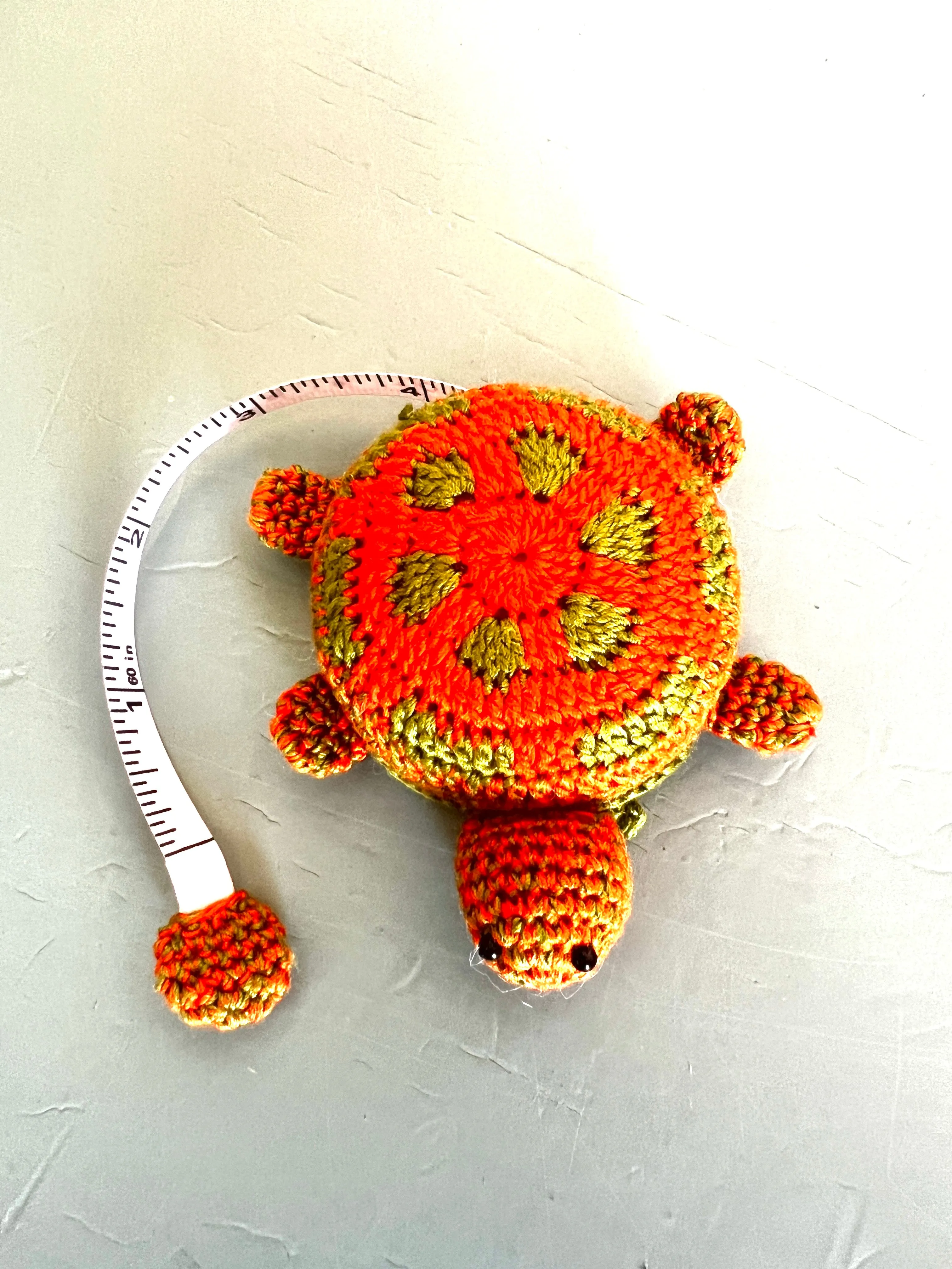 "Animal House" Tape Measures, hand crocheted by displaced persons