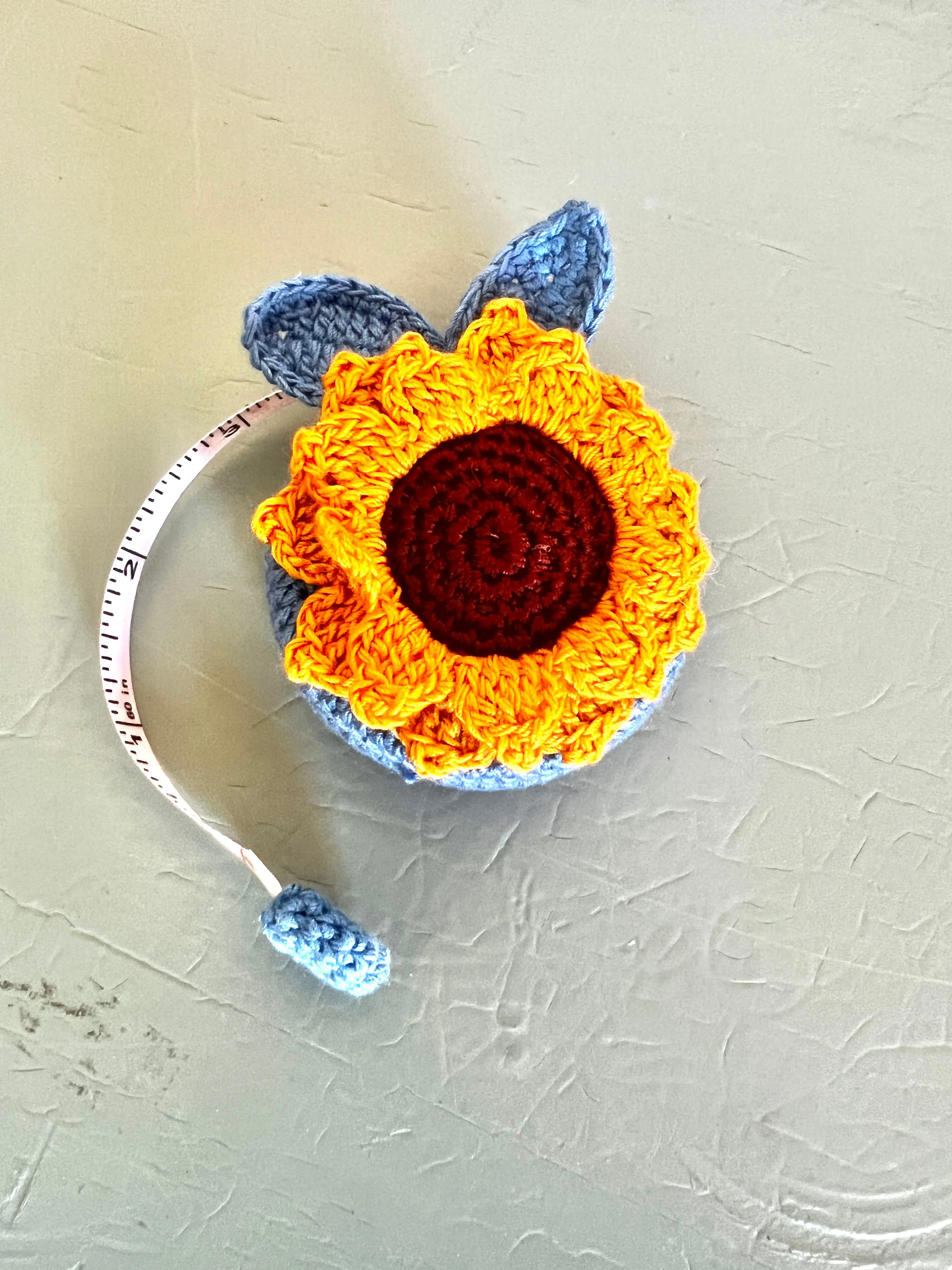 "Animal House" Tape Measures, hand crocheted by displaced persons