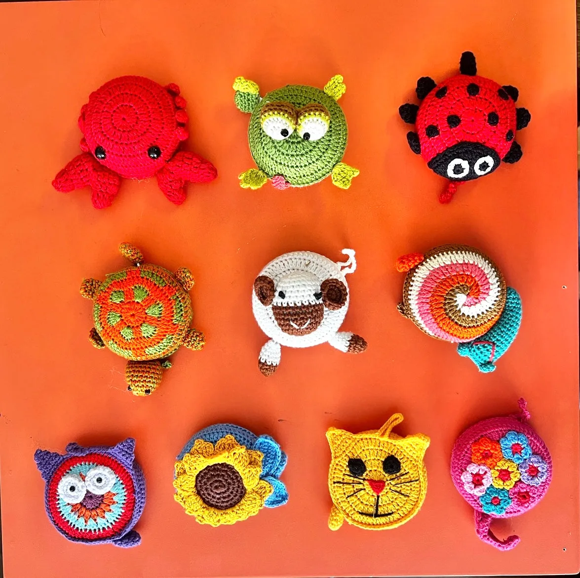 "Animal House" Tape Measures, hand crocheted by displaced persons