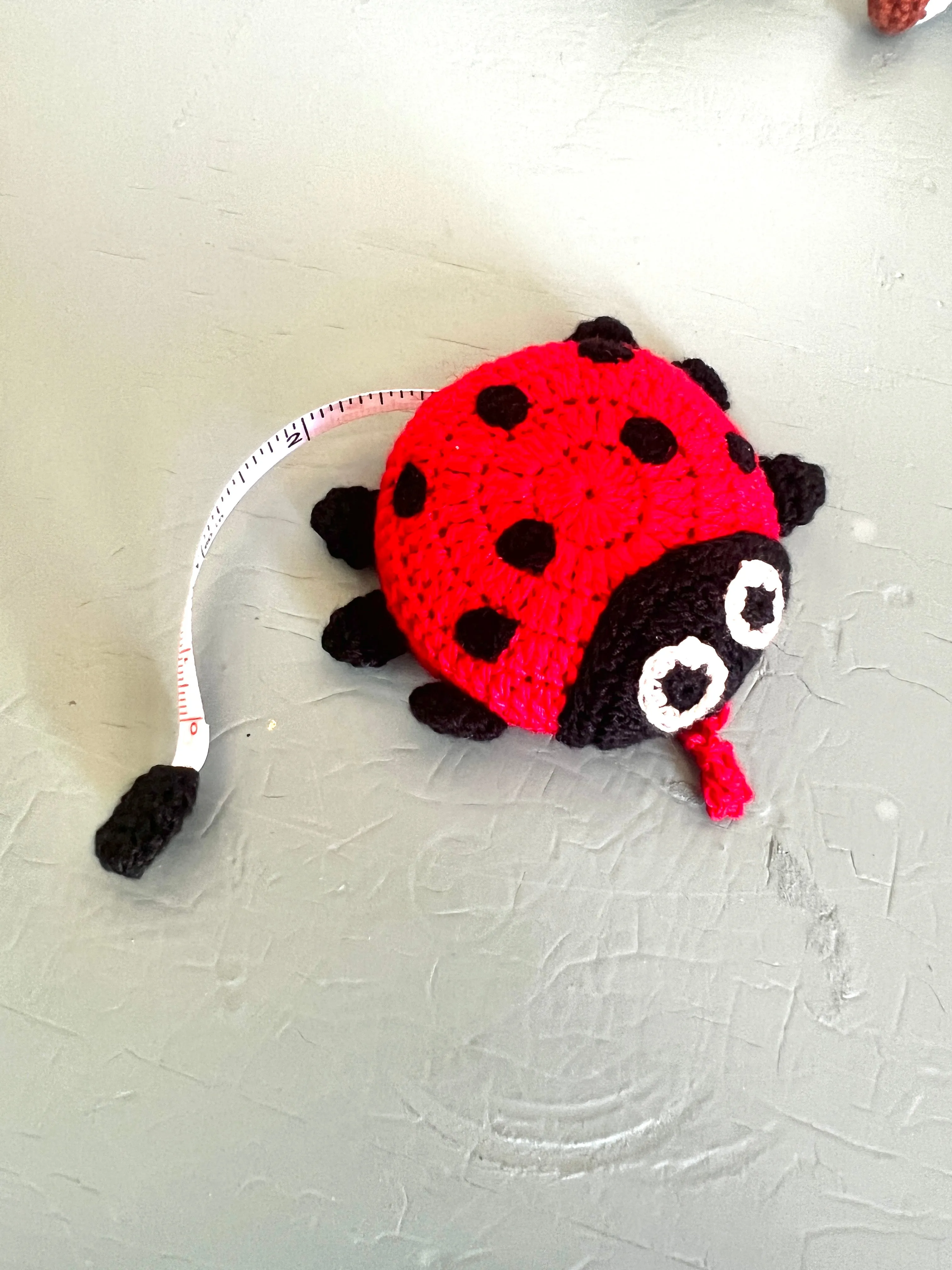 "Animal House" Tape Measures, hand crocheted by displaced persons