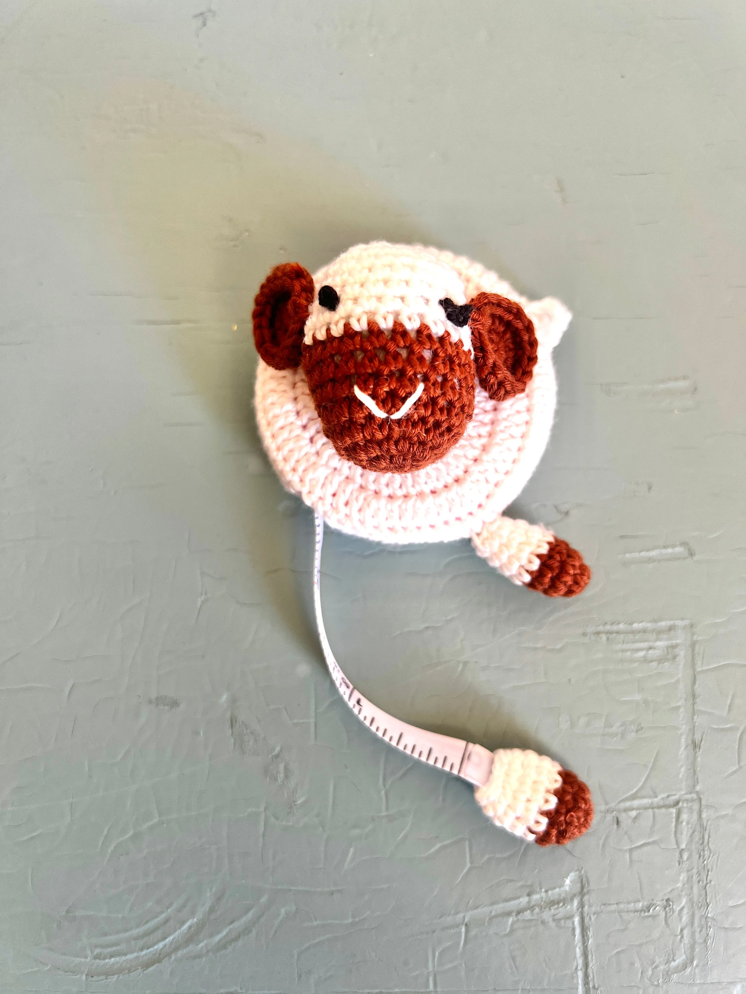 "Animal House" Tape Measures, hand crocheted by displaced persons