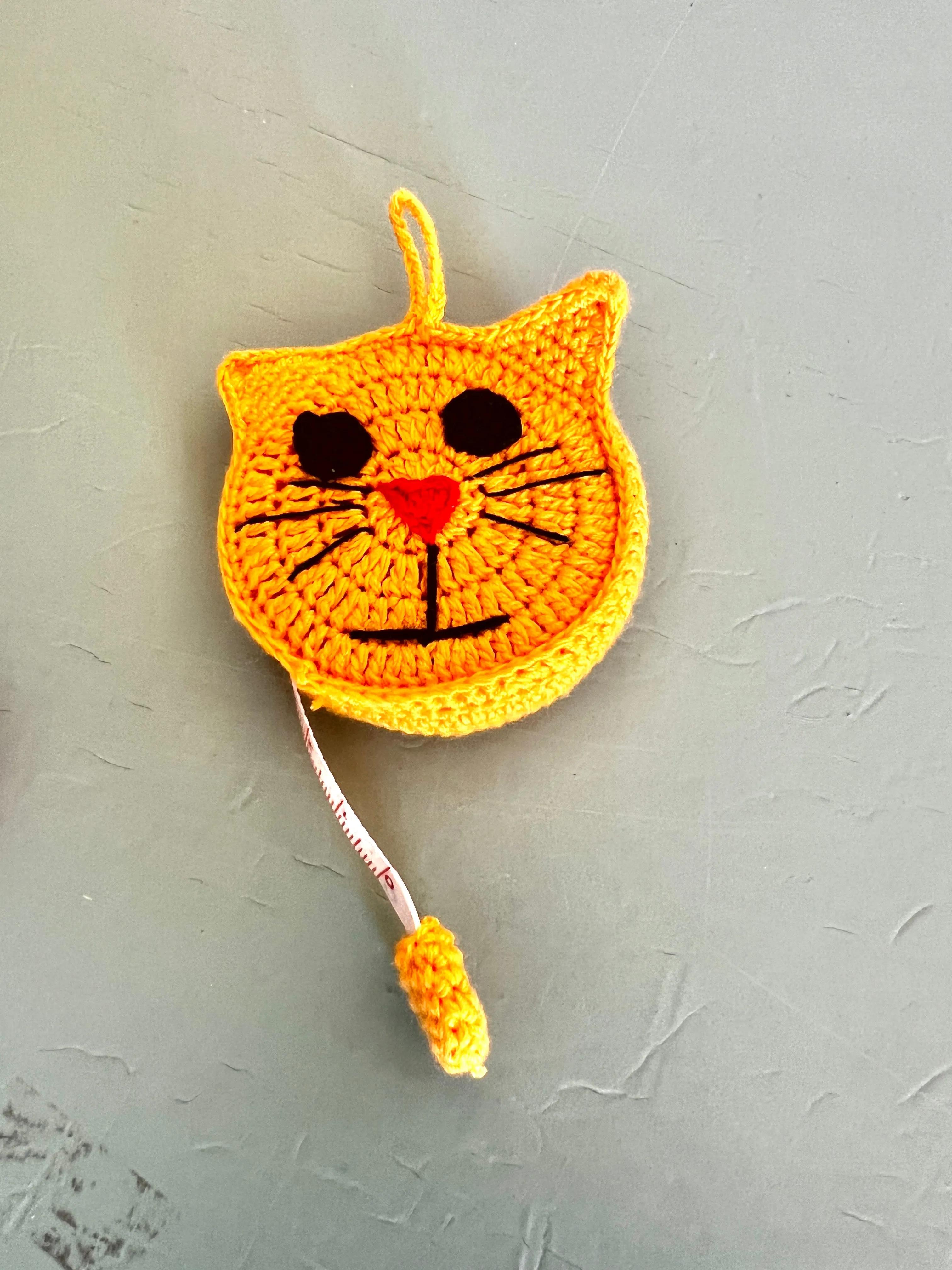 "Animal House" Tape Measures, hand crocheted by displaced persons
