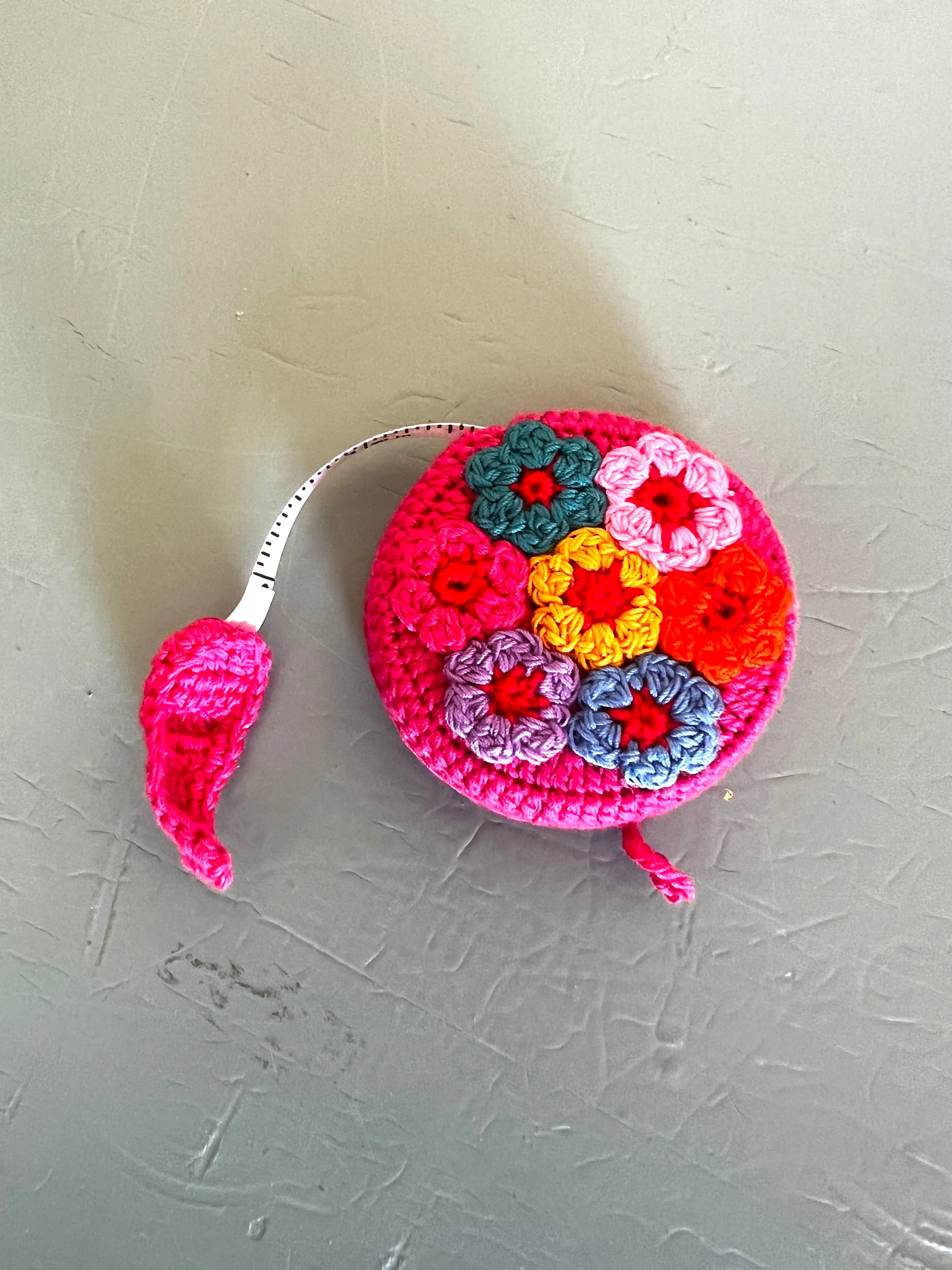 "Animal House" Tape Measures, hand crocheted by displaced persons